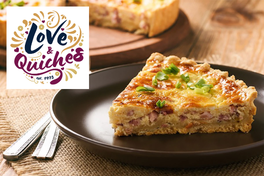 Slice of quiche on a brown plate with green garnish, shown next to the Love &amp; Quiches logo.