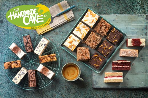 Assortment of sliced cakes arranged on trays and a cooling rack with a cup of coffee, shown next to The Handmade Cake Company logo.